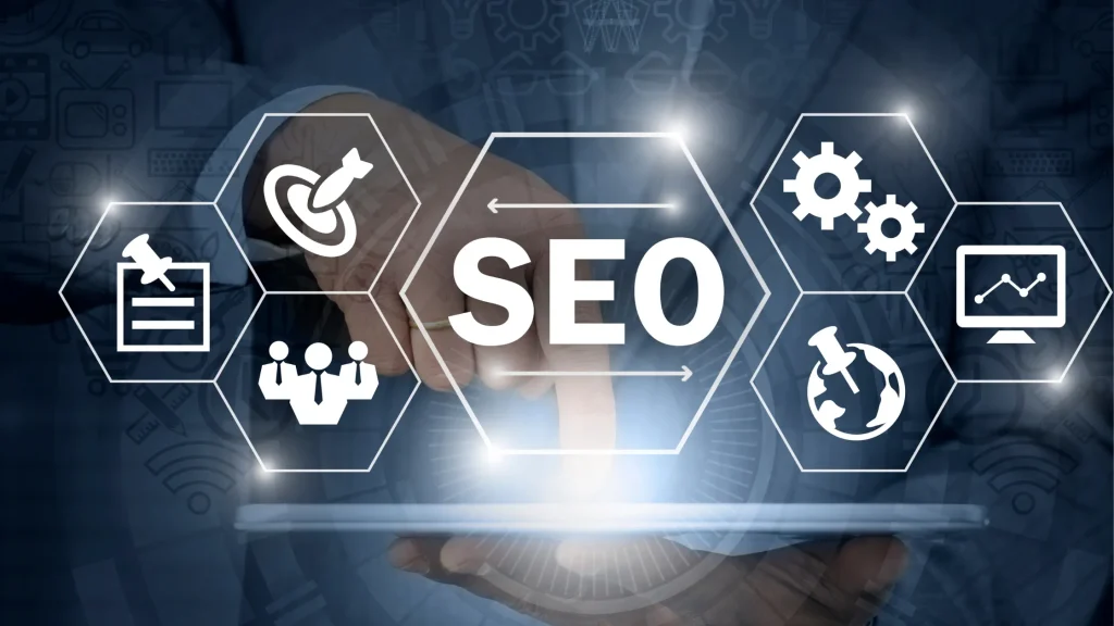 Hand tapping a tablet with SEO icons representing competitive intelligence for SEO strategies.